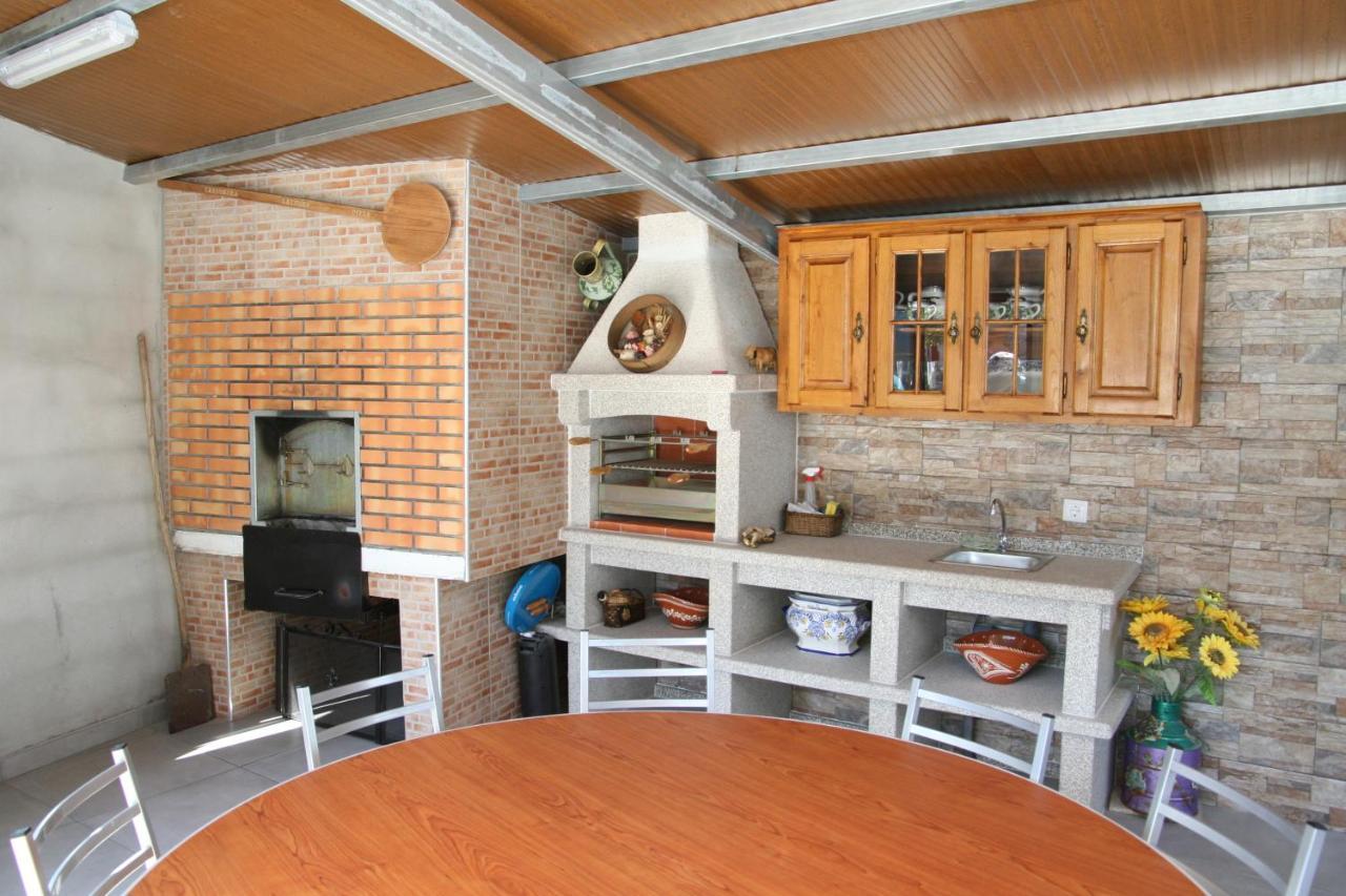 Appartamento Casa Da Pizzaria Carapito Esterno foto